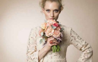 Female model posing with a bouquet